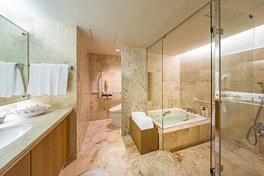 Indulge in comfortable bath with washing area